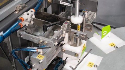 Container cartoning machine cartoning product